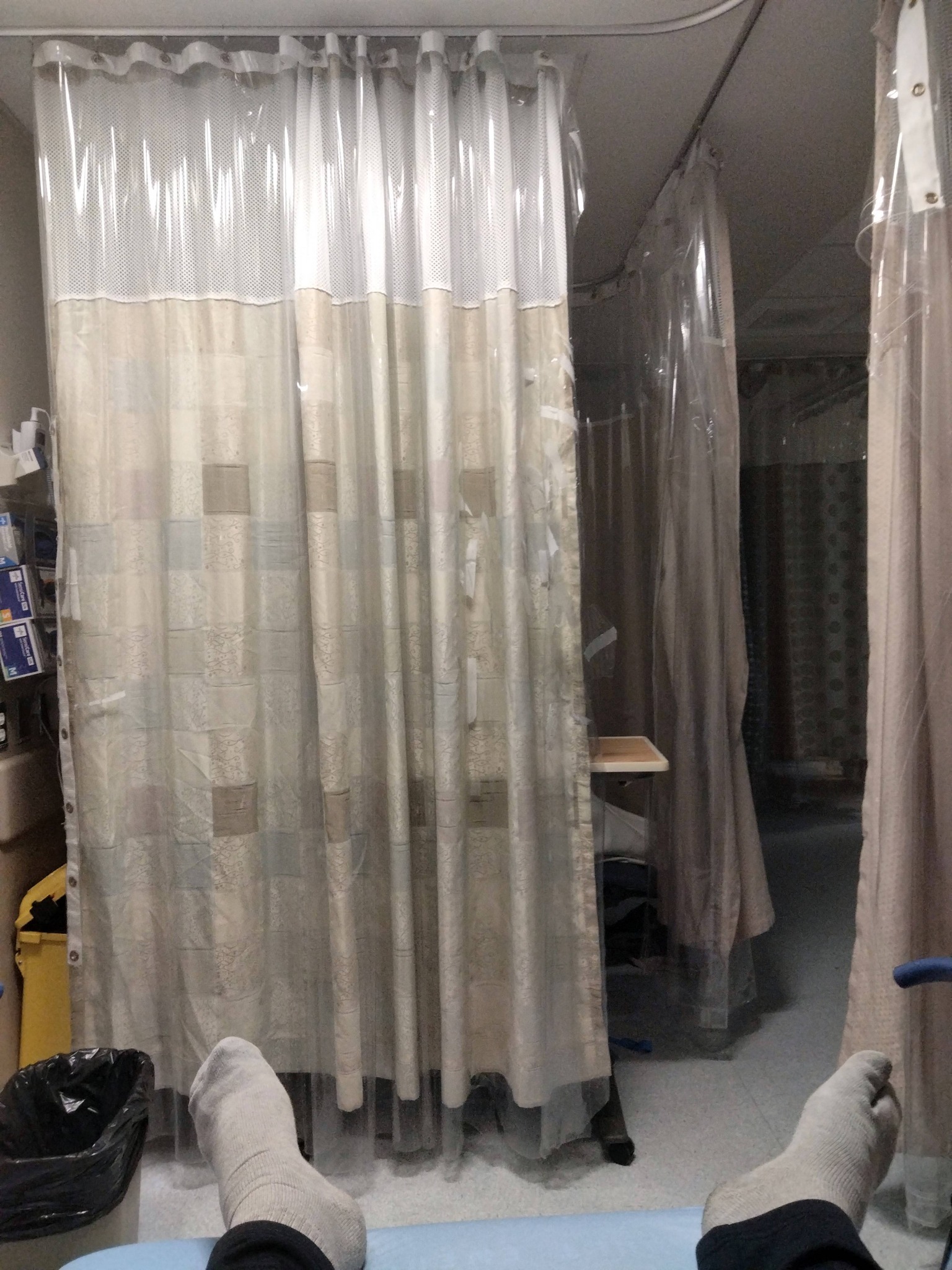 Emergency Room but in the back this time, with my socks showing.