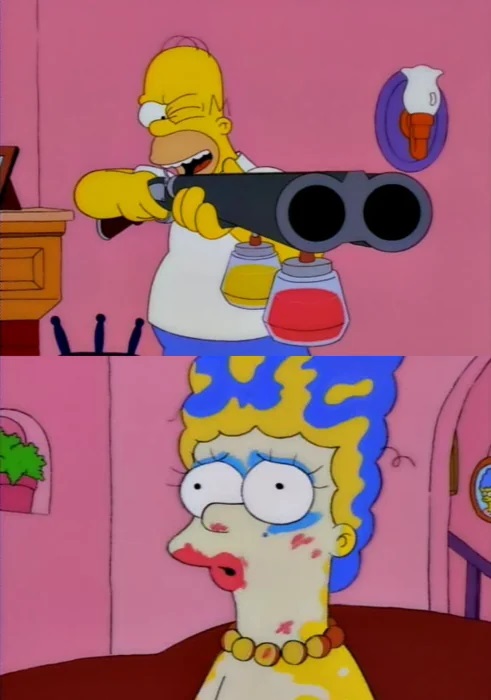 The Simpsons. Homer shoots a paint gun into Marge's face, leaving her looking like a clown.