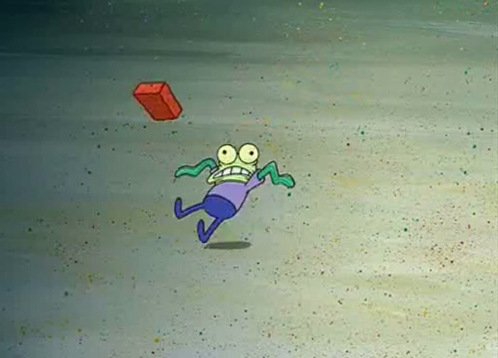 A fish character from Spongebob Squarepants having a brick thrown at him.